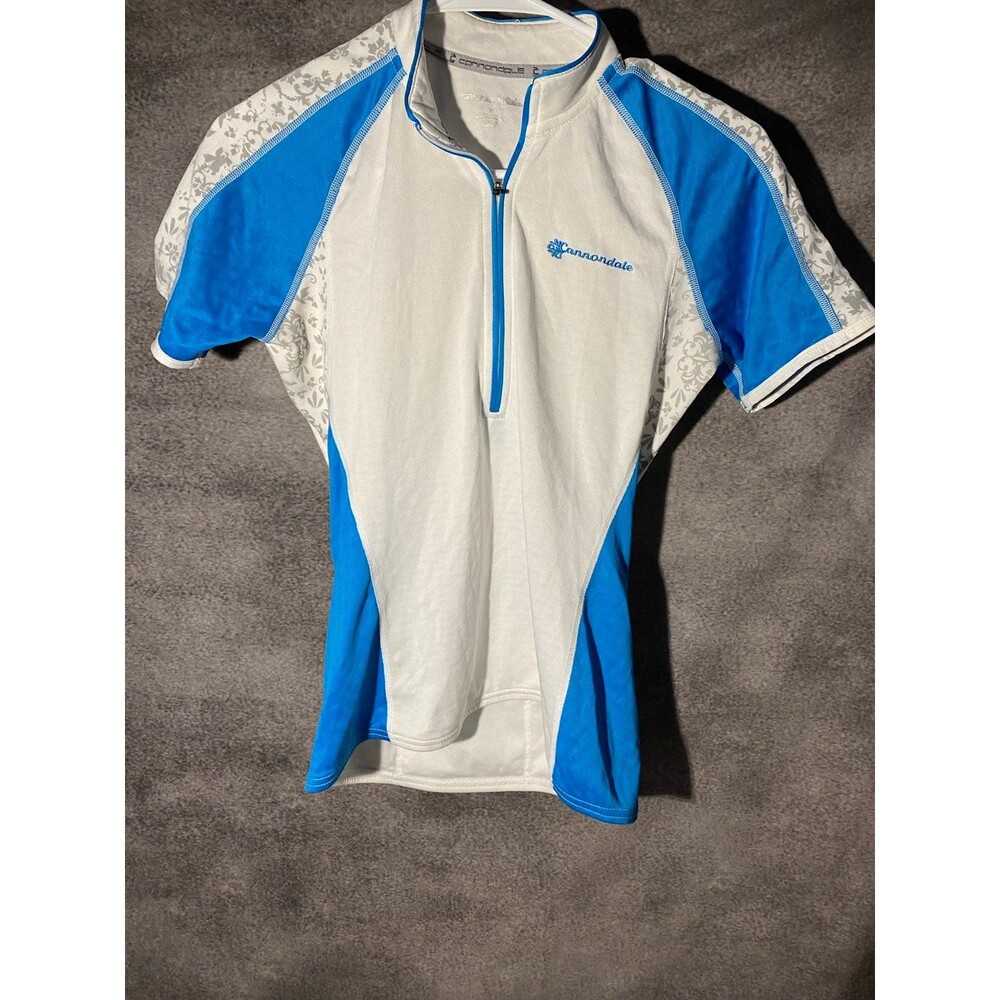 Cannondale Women Small Cycling Jersey Blue White Floral 1/4 Zip 3 Pocket - Picture 1 of 10